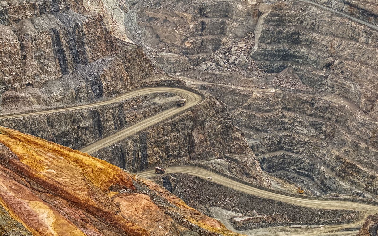 Aerial view of an open-pit mine with haul roads